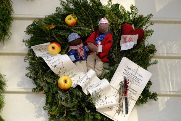 Nine hand stitched fleece snowmen. Stitched by the photographer.