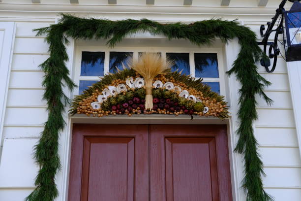 Beautiful Christmas wreaths hanging on the outside of doors.