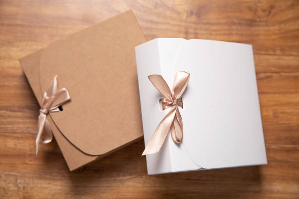 istock Gift box on the wooden background. 2188792962