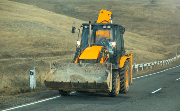 istock Industrial tractor on the highway road. Armenia 2188793393
