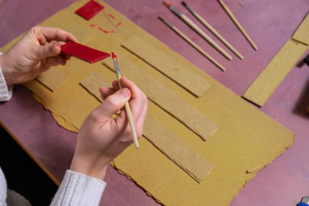 istock Wooden Christmas tree Sustainable preparation Diy process of making handmade decoration. Step by step activity for children. Inclusive and responsible stress relief holiday hobby 2188799347