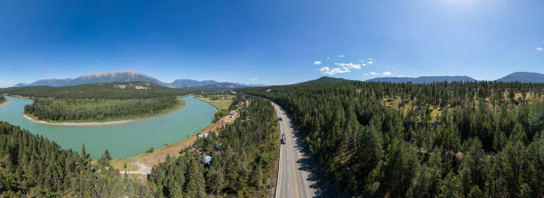 istock Aerial View of Scenic Mountain Highway and River Bend 2188805837