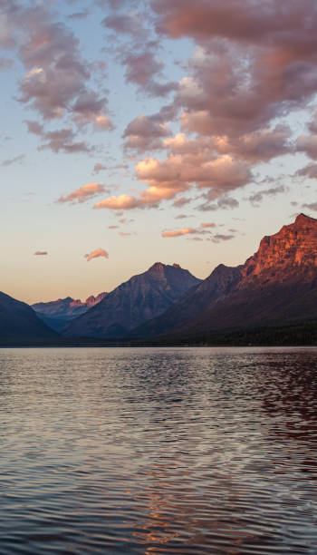 istock Tranquil Mountain Lake with Majestic Peaks at Sunset 2188806645