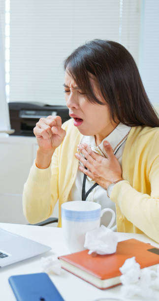 istock Asian woman office cold symptoms 2188807571