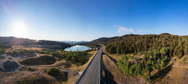 istock Scenic Highway View Through British Columbia Forests and Lakes at Sunset 2188809282