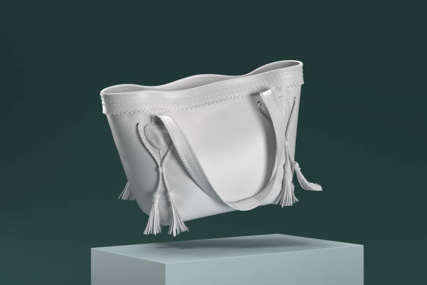 istock A white purse with fringes is shown in a 3D rendering 2188813968
