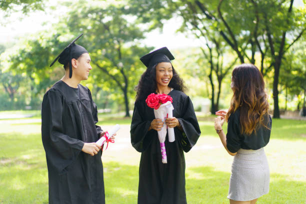 istock Happy and excited students in their graduation ceremony. 2188814033