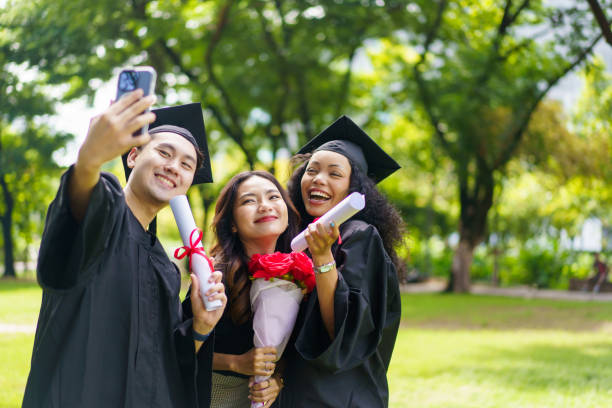 istock Happy and excited students in their graduation ceremony. 2188814050