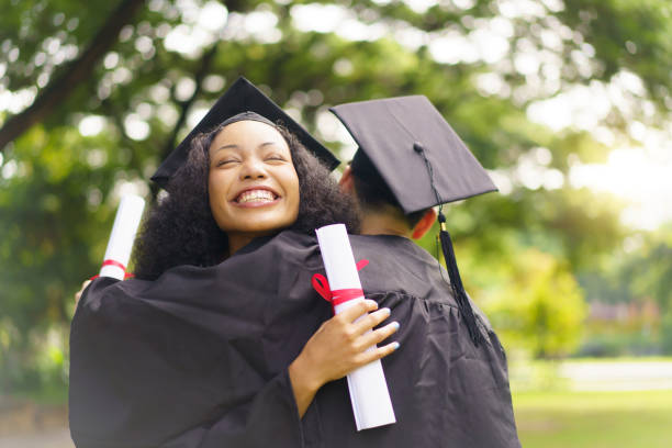istock Happy and excited students in their graduation ceremony. 2188814069