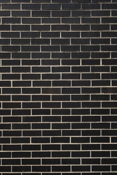istock Part of a black brick wall 2188815683