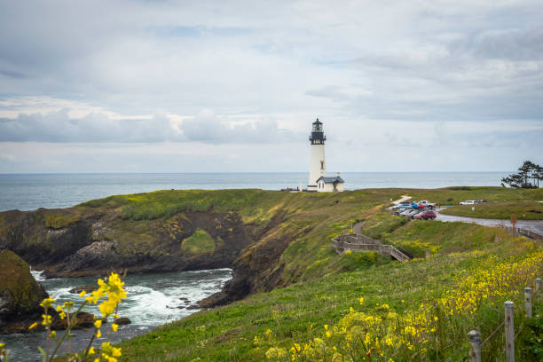 istock Yaquina Head Lighthouse against Pacific Ocean shores 2188816418