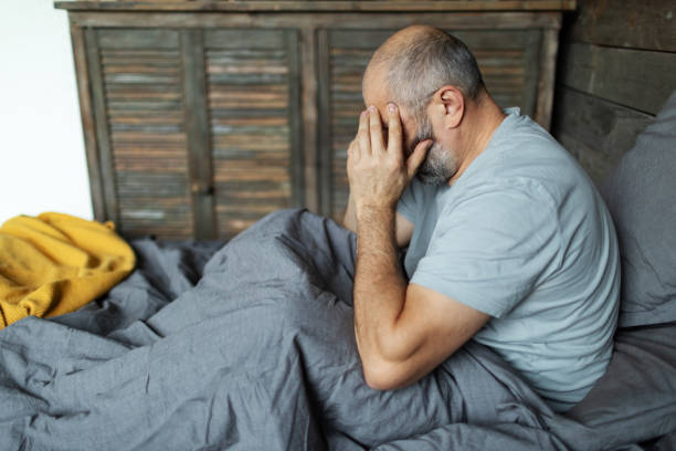 istock Mature man feeling depressed in bedroom 2188816638