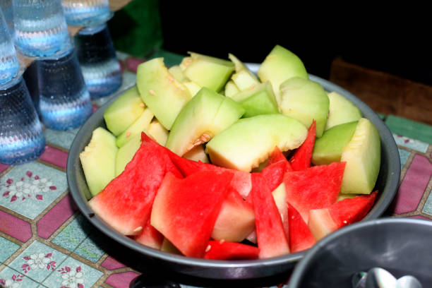 cut melon and watermelon on a tray