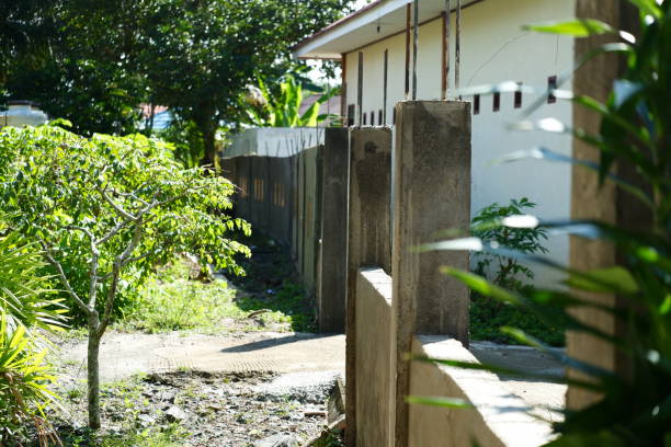 istock unfinished concrete wall fence building 2188819191