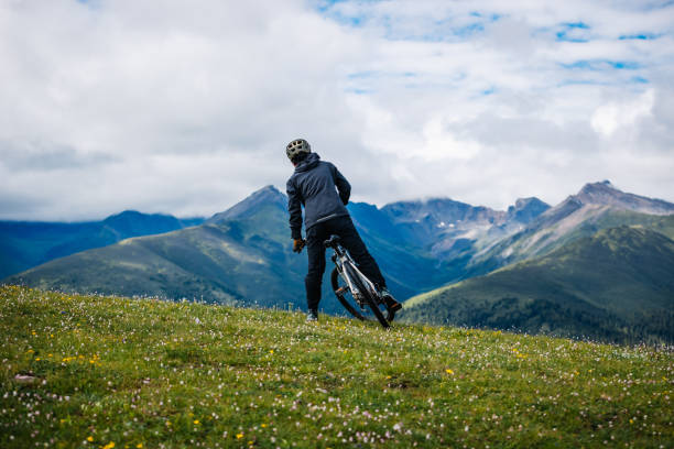 istock Riding mountain bike on grassland mountain top 2188819604