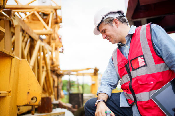 istock Thirsty and tired worker setting on the floor. 2188822350