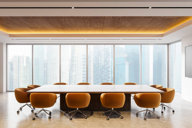 istock Cozy conference interior with table and chairs, tv screen and panoramic window 2188823487