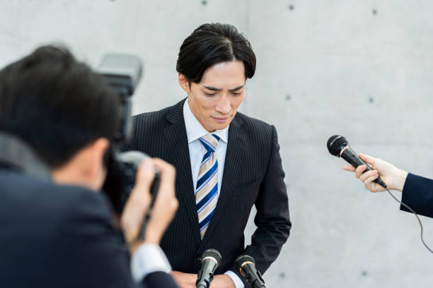 istock Businessman holding an apology interview 2188824777