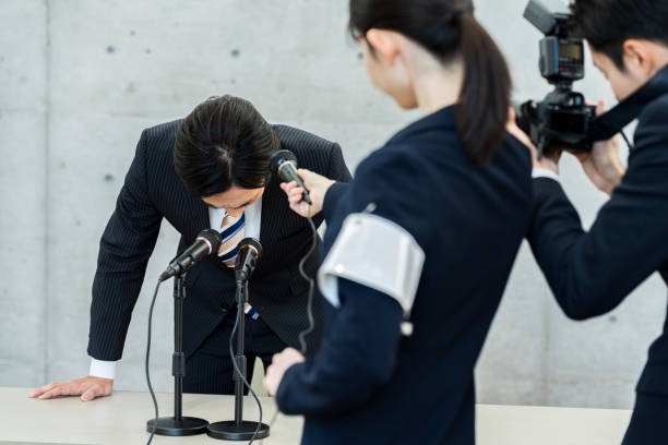 istock Businessman holding an apology interview 2188824837