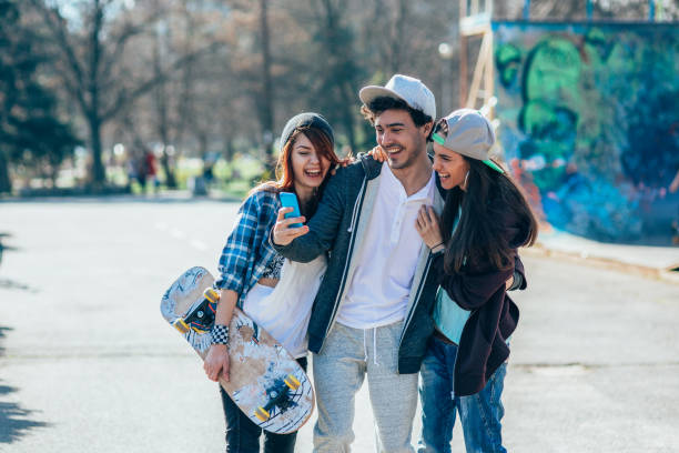 istock Hanging out with good friends in the park 2188826497