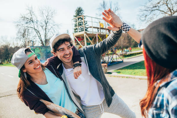 istock Hanging out with good friends in the park 2188826499