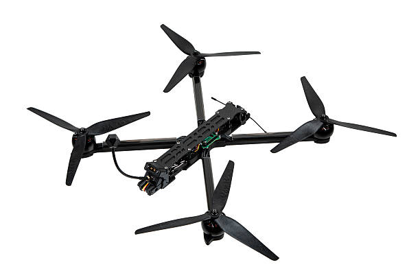 Modern FPV drone on a white background. Four-engine aircraft on the radio control. Drone for racing, filming and entertainment.