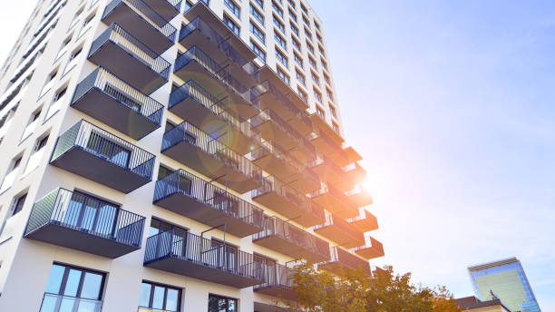 istock Modern high-rise apartment building  in white 2188826806