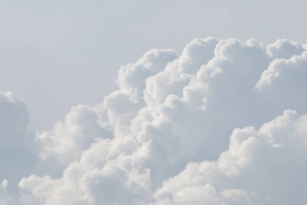 istock white cloud background and texture. The sky is filled with fluffy white clouds, creating a serene. 2188827458