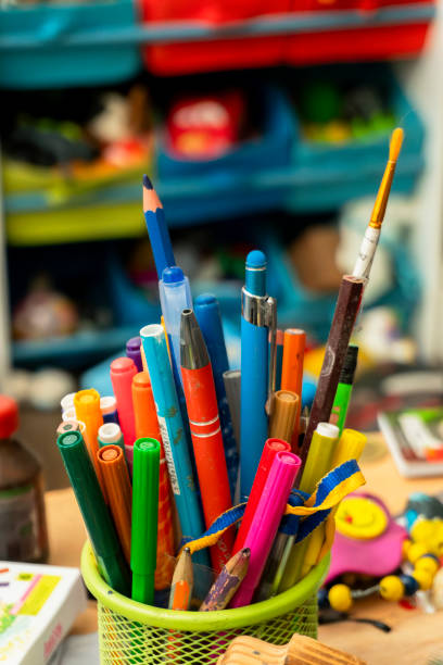 istock Colorful collection of writing instruments in a creative workspace 2188829433