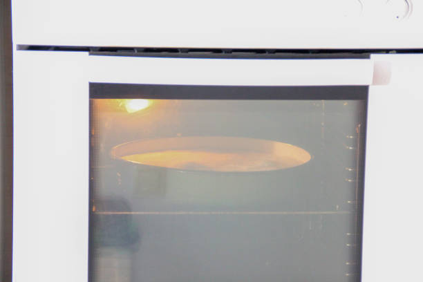 istock Homemade pie with cheese is baked in the oven 2188832075