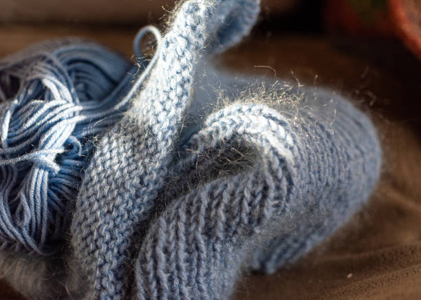 istock knitted handicraft, beautiful knitting pattern, handicraft concept, making clothes by hand 2188833296