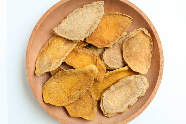 istock Sliced and dried rhizome of Curcuma zanthorrhiza, or temulawak, or Java ginger, or Javanese ginger, or Javanese turmeric. Isolated on white background. Flat lay or top view 2188836838