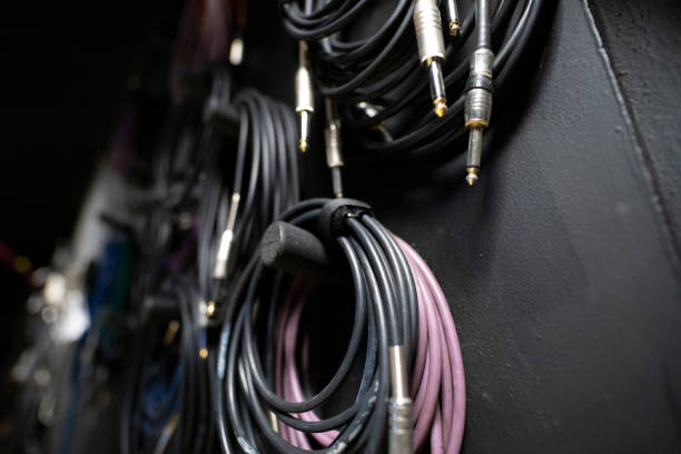 istock Lots of different audio and internet cables in a dark studio room 2188837553