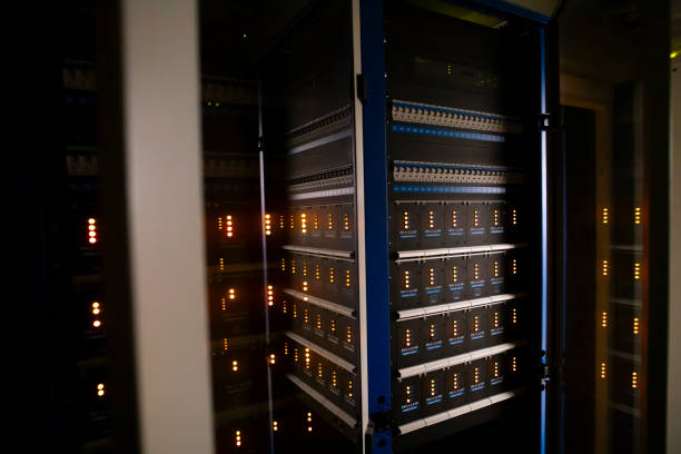 istock Dark server room with LED lights.  Central computer technology room of a small business. 2188837556