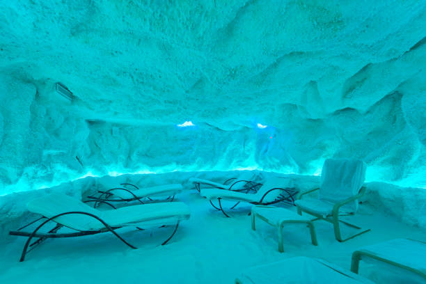 istock Illuminated salt cave interior with lounge chairs and therapeutic ambiance 2188844518