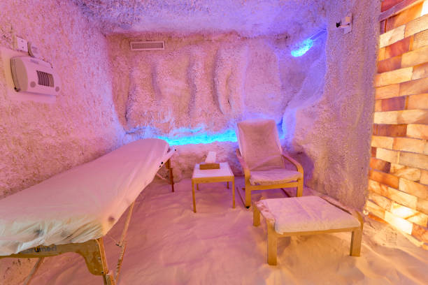 istock Salt therapy room with massage table and chairs in a relaxing ambiance 2188844823