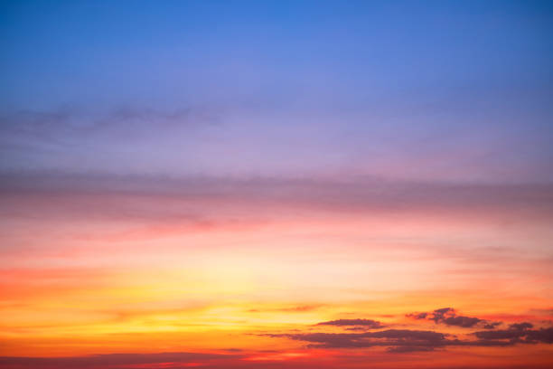 istock Sky,sunset, beautiful , luxury soft gradient orange gold clouds and sunlight on the blue sky perfect for the background, Sunrise on morning or evening in winter warm time ,Twilight summer,silhouette 2188845756