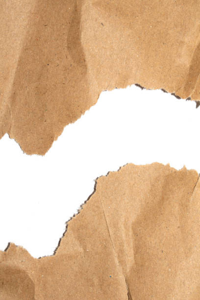 istock Ripped and Torn Jagged Paper Card Background in Brown 2188852404