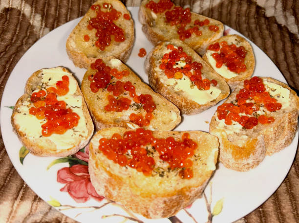 istock Fried croutons with butter and red caviar 2188854650