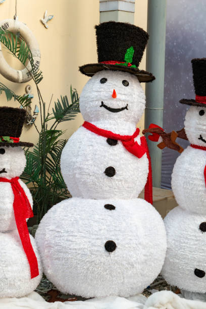istock big Christmas snowman in the outdoor at vertical composition 2188857105