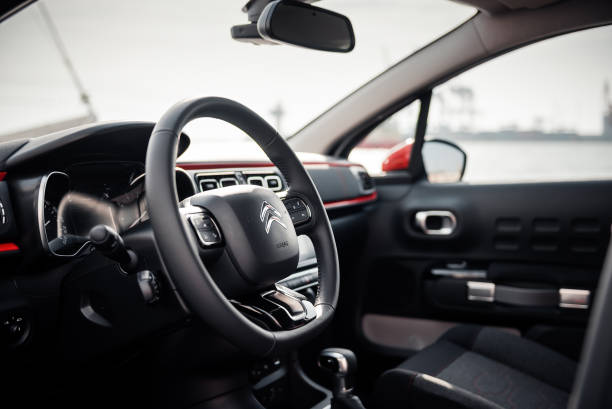 Steering wheel and dashboard of compact hatchback by the sea. Odesa, Ukraine - May 01 2017.