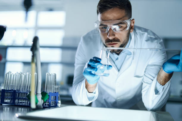 istock Male biotechnologist testing fluids in a laboratory 2188863229