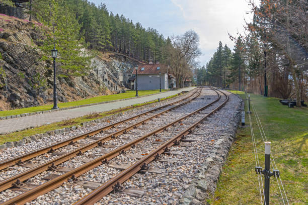 Mokra Gora, Serbia - March 18, 2017: Sargan Eight Narrow Gauge Railway Empty Train Station Platform Jatare Spring Day.