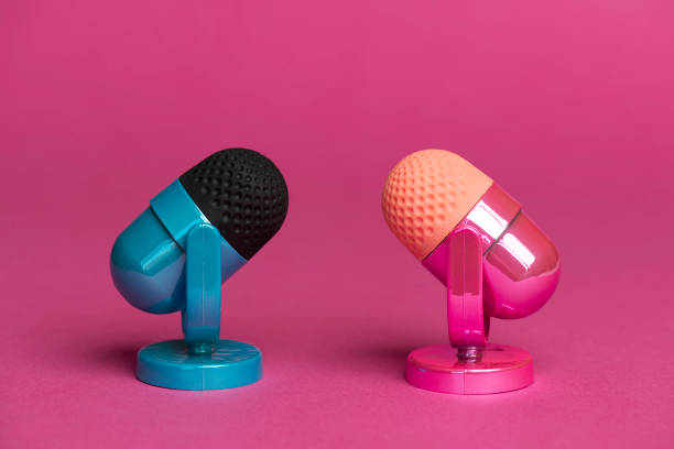 istock Colorful Microphones on Pink Background 2188873432