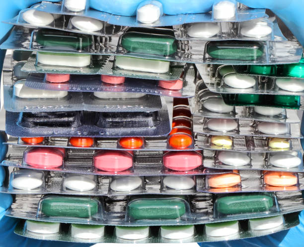 istock Various colored pills in packages at the pharmacy 2188878577