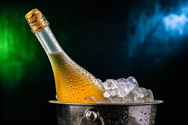 istock Bottle of sparkiling wine in bucket with crushed ice. 2188882425