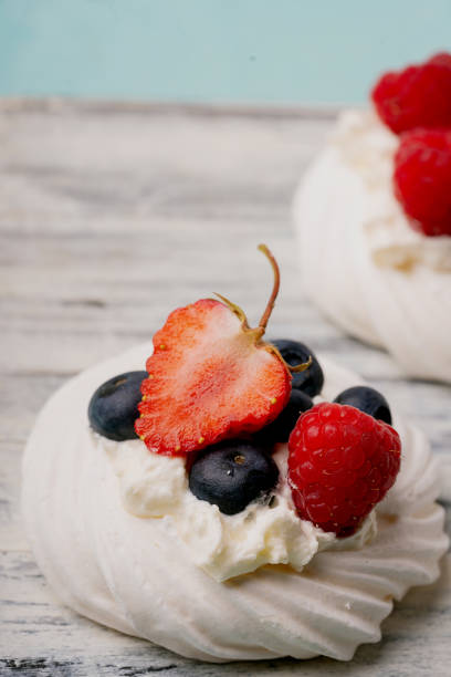 istock mini Pavlova deserts with favious berries 2188885614