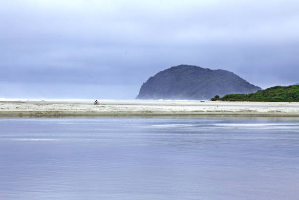 wooden gazebo among the vegetation on the rocks, during a tropical storm that approaches Boraceia beach from the sea - SAO SEBASTIAO,  SAO PAULO,  BRAZIL.