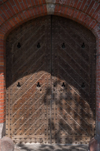 Old wooden gate in the building