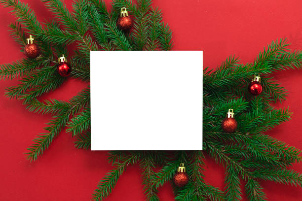 istock Christmas backdrop, white card blank empty copy space. Post cart holiday design. New year background.Frame. Fir tree branches and baubles flat lay. Xmas banner advertisement promotion design, 2188896843